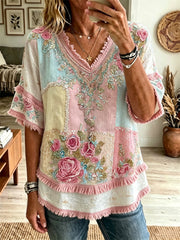 Damenhemd aus Baumwoll-Leinen mit Vintage-Print in Pink, floralen Rosen und Farbblock-Optik, besetzt mit Fransenborte