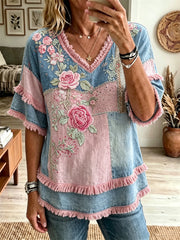 Damenhemd aus Baumwoll-Leinen mit Vintage-Print, rosa Rosen und Blumenmuster im Patchwork-Stil, besetzt mit Fransenborte