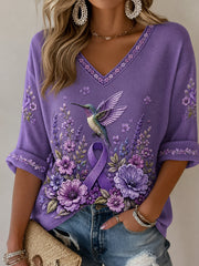 Damen-T-Shirt in Lila mit Blumen- und Kolibri-Print, halblangen Ärmeln und V-Ausschnitt – Unterstützung für das Bewusstsein rund um die Alzheimer-Krankheit