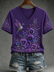 Damen-T-Shirt mit violetter Blumen- und Kolibri-Print, V-Ausschnitt und kurzen Ärmeln zur Sensibilisierung für die Alzheimer-Krankheit