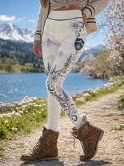 Damen-Leggings mit Kunstprint im österreichischen Stil – florale und schneebedeckte Bergmotive