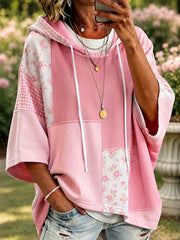 Damen-Kapuzenpullover in Rosa mit floralem Patchwork-Design