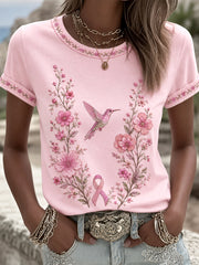 Damen-T-Shirt in Pink mit Blumen- und Kolibri-Print zur Unterstützung der Brustkrebsaufklärung