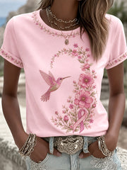 Damen-T-Shirt in Pink mit Blumen- und Kolibri-Print zur Unterstützung der Brustkrebsaufklärung