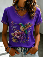 Damen-T-Shirt mit violetter Blumen-Print-Optik und V-Ausschnitt