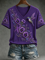Damen-T-Shirt mit violetter Blumen- und Kolibri-Print, V-Ausschnitt und kurzen Ärmeln zur Sensibilisierung für die Alzheimer-Krankheit
