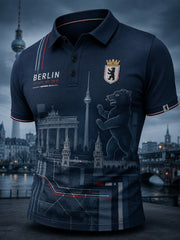 Herren-Poloshirt mit kurzen Ärmeln und urbanem, erinnerungsträchtigem Grafikdruck