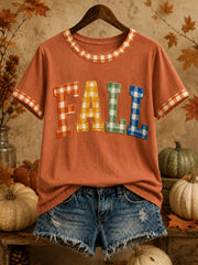 Damen-T-Shirt mit Plaid-Kunstdruck im Herbst