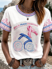 Damenweißes Freizeit-T-Shirt mit Glitzerdruck zum Thema Brustkrebs und Fahrrad