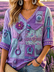 Damen-T-Shirt in Lila mit Patchwork-Muster und Aufdruck zur Sensibilisierung für Alzheimer, mit mittellangen Ärmeln und V-Ausschnitt