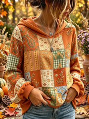 Weibliches, vintage Herbst-Sweatshirt mit floralem Patchwork-Print und bequemer Kapuze