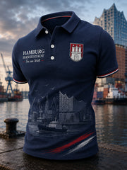 Herren-Poloshirt mit kurzen Ärmeln und urbanem, erinnerungsträchtigem Grafikdruck